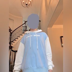 I am selling a light blue sweatshirt that says New York on the chest